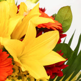 Sun Delight BouquetThis Beautiful Bouquet, carefully selected flowers with foliage are expertly arranged to create this dramatic design. This stunning gift is the ultimate gift to create an impression. Beautifully wrapped and tied with ribbon before being