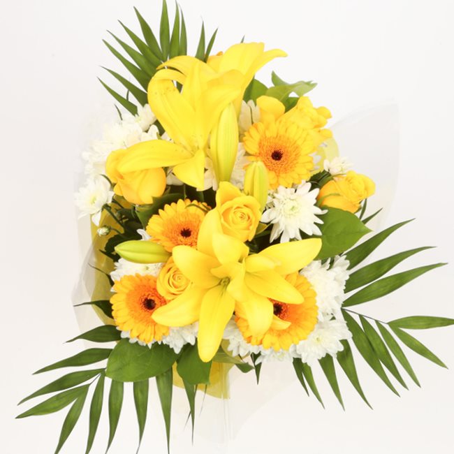 Birthday Balloon & Lovely Lemon FlowersThis Beautiful Bouquet, carefully selected flowers with foliage are expertly arranged to create this dramatic design. This stunning gift is the ultimate gift to create an impression. Beautifully wrapped and tied with
