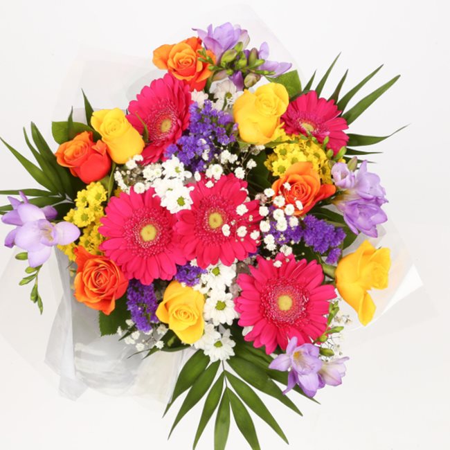 Brilliant Blooms Flowers BouquetThis Beautiful Bouquet, carefully selected flowers with foliage are expertly arranged to create this dramatic design. This stunning gift is the ultimate gift to create an impression. Beautifully wrapped and tied with ribbon