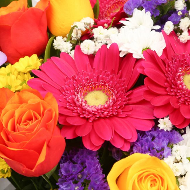 Love You Balloon & Brilliant Blooms BouquetThis Beautiful Bouquet, carefully selected flowers with foliage are expertly arranged to create this dramatic design. This stunning gift is the ultimate gift to create an impression. Beautifully wrapped and tied