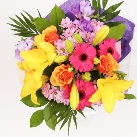 Embrace Flowers BouquetThis Beautiful Bouquet, carefully selected flowers with foliage are expertly arranged to create this dramatic design. This stunning gift is the ultimate gift to create an impression. Beautifully wrapped and tied with ribbon before b