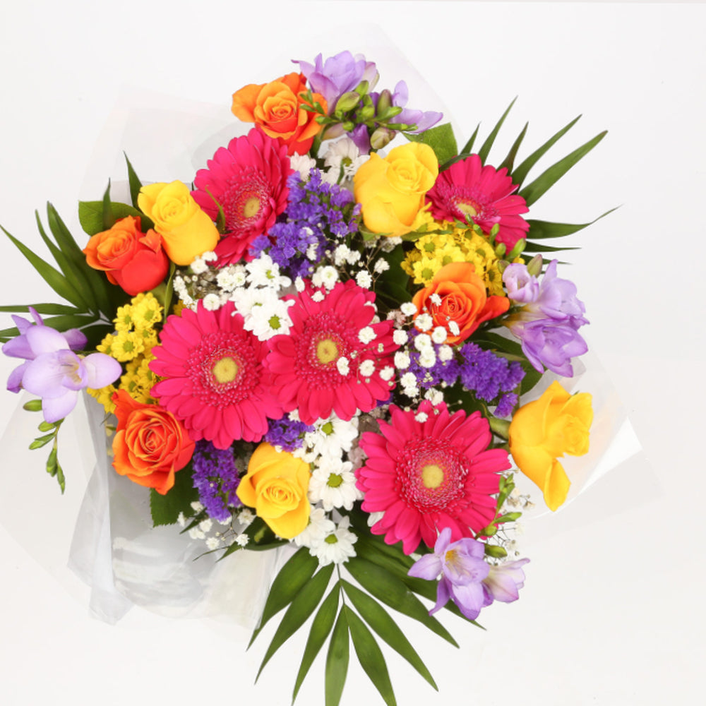 Brilliant Blooms Flowers BouquetThis Beautiful Bouquet, carefully selected flowers with foliage are expertly arranged to create this dramatic design. This stunning gift is the ultimate gift to create an impression. Beautifully wrapped and tied with ribbon