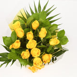 Yellow Gold RosesThis Beautiful Bouquet, carefully selected flowers with foliage are expertly arranged to create this dramatic design. This stunning gift is the ultimate gift to create an impression. Beautifully wrapped and tied with ribbon before being d