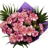 A Beautiful Purple Candy Carnations MelodyBeautiful Purple Candy Carnations Melody and foliage to create this beautifully scented bouquet. Beautifully wrapped and tied with ribbon before being delivered. A Beautiful Bouquet Hand Tied Flowers. Delivering G