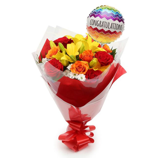 Congratulations Balloon & Floral Embrace FlowersThis Beautiful Bouquet with Balloon , carefully selected flowers with foliage are expertly arranged to create this dramatic design. This stunning gift is the ultimate gift to create an impression. Beautifull