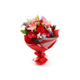 Red & Pink Delight BouquetThis Beautiful Bouquet, carefully selected flowers with foliage are expertly arranged to create this dramatic design. This stunning gift is the ultimate gift to create an impression. Beautifully wrapped and tied with ribbon befor