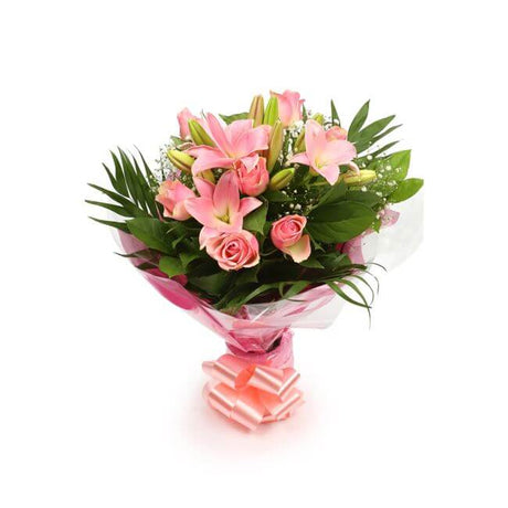 Pink Jewel BouquetThis Beautiful Bouquet, carefully selected flowers with foliage are expertly arranged to create this dramatic design. This stunning gift is the ultimate gift to create an impression. Beautifully wrapped and tied with ribbon before being