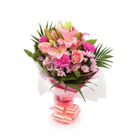 Pink Candy BouquetThis Beautiful Bouquet, carefully selected flowers with foliage are expertly arranged to create this dramatic design. This stunning gift is the ultimate gift to create an impression. Beautifully wrapped and tied with ribbon before being