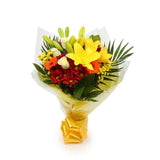 Sun Delight BouquetThis Beautiful Bouquet, carefully selected flowers with foliage are expertly arranged to create this dramatic design. This stunning gift is the ultimate gift to create an impression. Beautifully wrapped and tied with ribbon before being