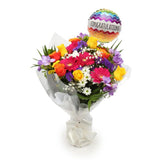 Congratulations Balloon & Brilliant Blooms FlowersThis Beautiful Bouquet, carefully selected flowers with foliage are expertly arranged to create this dramatic design. This stunning gift is the ultimate gift to create an impression. Beautifully wrapped an