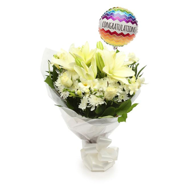 Congratulations Balloon & White Elegance FlowersThis Beautiful Bouquet, carefully selected flowers with foliage are expertly arranged to create this dramatic design. This stunning gift is the ultimate gift to create an impression. Beautifully wrapped and