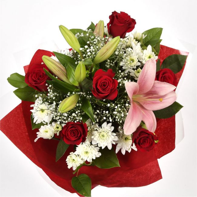 Luxury Princess BouquetRed Roses, Bloom Chrysanthemums, Oriental Lilies and Palm foliage are expertly arranged to create this dramatic design. This stunning gift is the ultimate gift to create an impression. Beautifully wrapped and tied with ribbon before