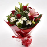 Luxury Princess BouquetRed Roses, Bloom Chrysanthemums, Oriental Lilies and Palm foliage are expertly arranged to create this dramatic design. This stunning gift is the ultimate gift to create an impression. Beautifully wrapped and tied with ribbon before