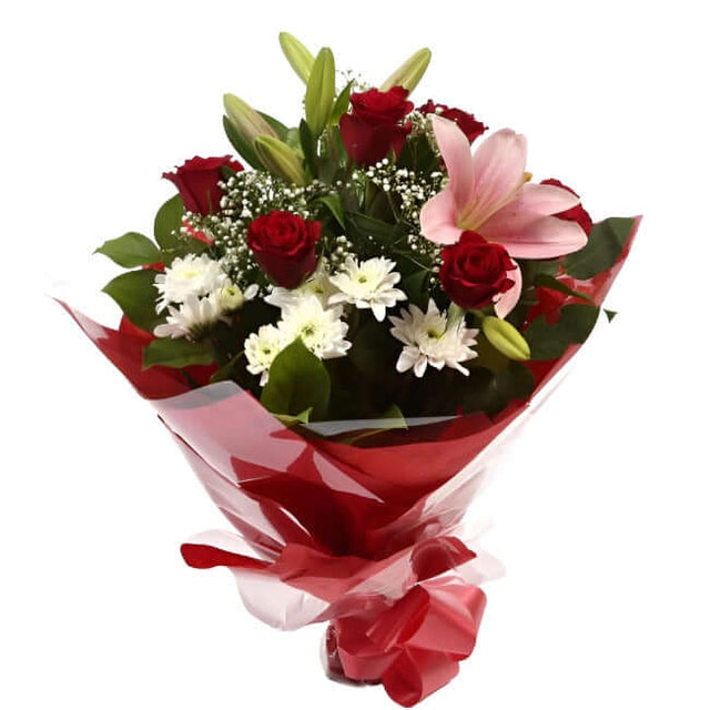 Luxury Princess BouquetRed Roses, Bloom Chrysanthemums, Oriental Lilies and Palm foliage are expertly arranged to create this dramatic design. This stunning gift is the ultimate gift to create an impression. Beautifully wrapped and tied with ribbon before