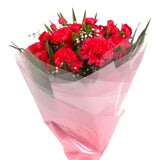 A Beautiful Red Carnations MelodyBeautiful Red Carnations Melody and foliage to create this beautifully scented bouquet. Beautifully wrapped and tied with ribbon before being delivered. A Beautiful Bouquet Hand Tied Flowers. Delivering Great Value Fresh C