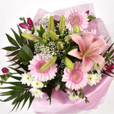 Pink Princess BouquetAn alluring hand-tied bouquet featuring Oriental Lilies, Gerberas, Anastasias, Gypsophila, in an array of pinks with striking Fressias & Chrysanthemums as highlights. A truly glamorous gift for any special occasion. Beautifully wrappe