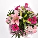 Pink Sienna BouquetThis lovely selection of flowers is the perfect gift for any occasion.Pink Germini, Pink Roses & Pink Spray with Palm Leaf and other assorted flowers are beautifully presented. Beautifully wrapped and tied with ribbon before being deliv