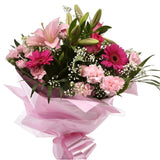 Pink Sienna BouquetThis lovely selection of flowers is the perfect gift for any occasion.Pink Germini, Pink Roses & Pink Spray with Palm Leaf and other assorted flowers are beautifully presented. Beautifully wrapped and tied with ribbon before being deliv