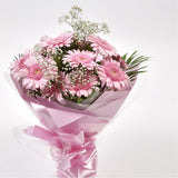 Pink Glamour GerberasPink Gerberas Presented with luxurious Pink Gypsophila foliage, Each product is handcrafted by one of our expert florists using the best flowers. Expertly created by our florists Beautifully wrapped and tied with ribbon before being d