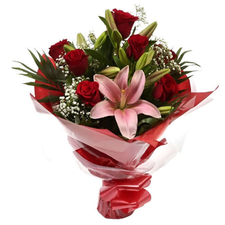 Special Rose and Lily BouquetSpecial Rose and Lily Bouquet Red Roses, Oriental Lilies and Palm foliage are expertly arranged to create this dramatic design. This stunning gift is the ultimate gift to create an impression. Beautifully wrapped and tied with