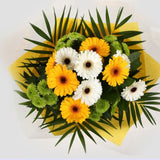 Birthday Balloon & Yellow Cream FlowersBirthday Balloon & Yellow Cream Bouquet mix of Chrysanthemum flowers in along with Yellow and White Germini all interspersed with delicate palm leaves. Beautifully wrapped and tied with ribbon before being delivered.