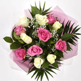 Pink & White RosesThis beautiful selection of fresh 12 Roses, in pretty Pink shades and in White, is a classic choice, ready to be displayed instantly. Beautifully wrapped and tied with ribbon before being delivered. Roses£14.99