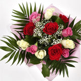 12 Sweet Expressions RosesLooking for the perfect way to express your sentiments to someone? Try our Sweet Expressions roses, a bouquet of roses pink, red, and white roses. impression with 12 Sweet Expressions roses. Beautifully wrapped and tied with ribb
