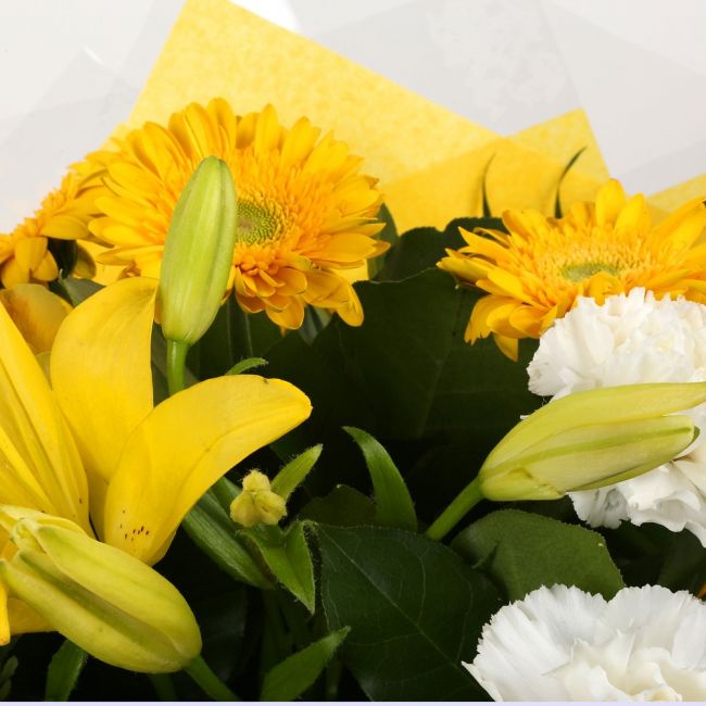 Birthday Balloon & Golden Sunshine FlowersBirthday Balloon & Golden Sunshine Bouquet, This lovely selection of flowers is the perfect gift for any occasion. White Dianthus, Yellow Roses & Yellow Lillies with assorted foliage are beautifully presented. Bea