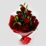 Red Roses & Lilly BouquetRed Roses & Lilly Bouquet, A beautiful Elegant bouquet featuring Red Roses, Pink Lillies, Red Chrysanthemums, Red Dianthus and Stylish Palm leaves with Foliage, perfect. Expertly created by our florists Beautifully wrapped and tie