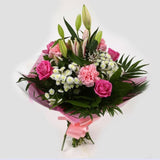 Strawberry Sundae BouquetStrawberry Sundae Bouquet, An endearing classic Bouquet, Lilies in soft pinks, White Santini, with Pink Roses, large exquisite headed Dianthus, Pink Roses are complemented by delicate Gypsophila, luxurious sophisticated hand-tied