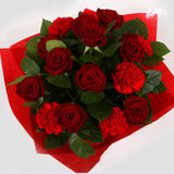 Heart Special Flowers BouquetHeart Special Bouquet Red Roses,Red Dianthus Palm foliage are expertly arranged to create this dramatic design. This stunning gift is the ultimate gift to create an impression. Beautifully wrapped and tied with ribbon before b